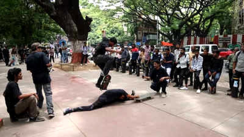 Skateboarding dominates urban roads.